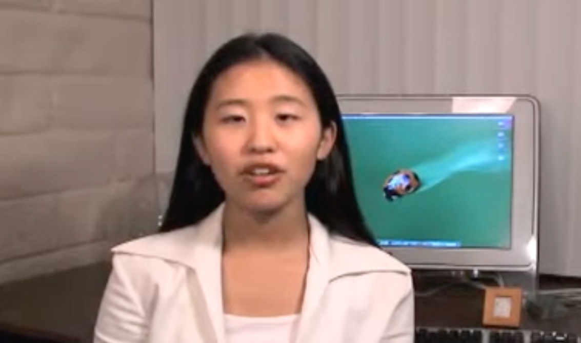 screen shot from video of an Asian woman speaking